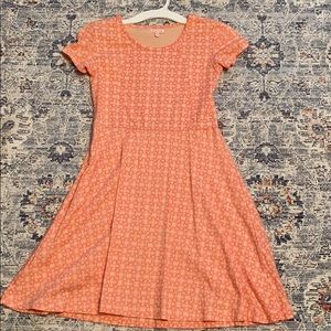 Peach Colored dress suitable for any occasion.